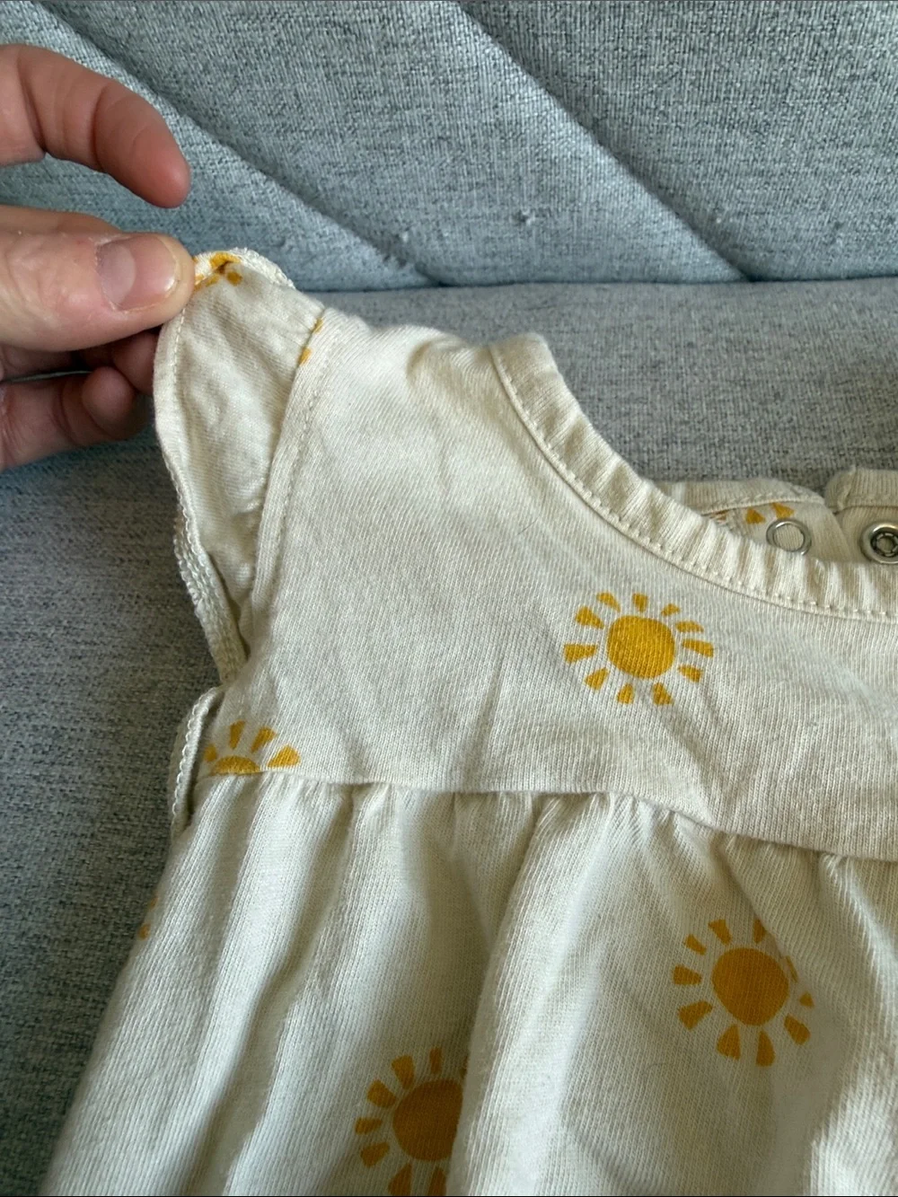 Old Navy Cream Baby Romper with Yellow Sun Print
